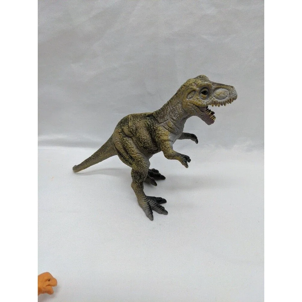 Lot Of (7) Dinosaur Toys Trex Stegasaurs Triceratops